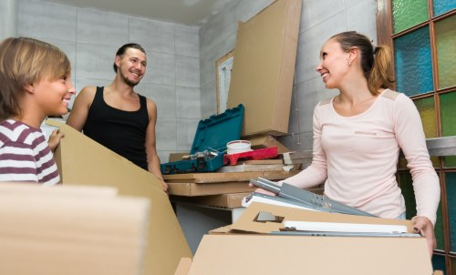 Man With Van Mazehill moving van loading boxes at a residential property