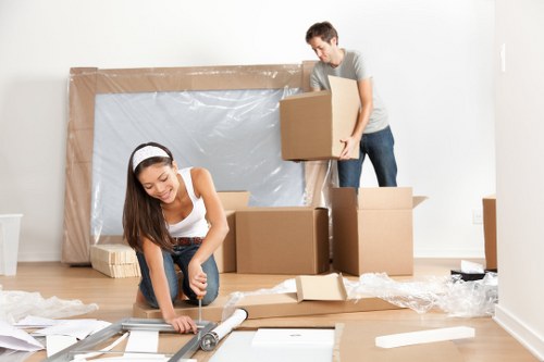 Removal team loading household items for a move in Maze Hill