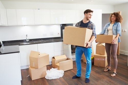 Local moving team loading furniture in Maze Hill
