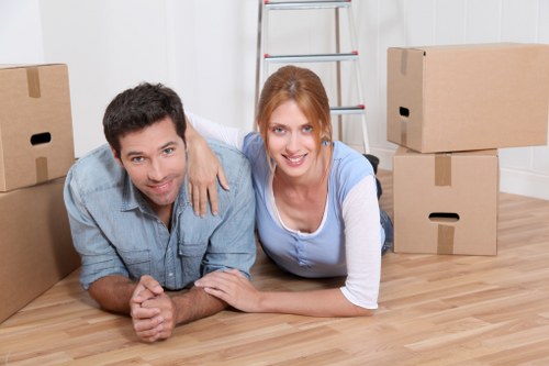 Packed office equipment and furniture ready for relocation