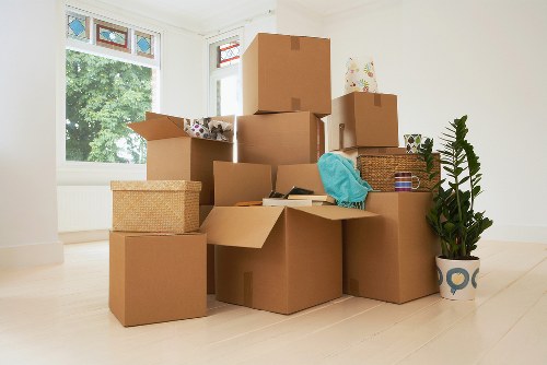 Packing and loading household items for a Maze Hill relocation