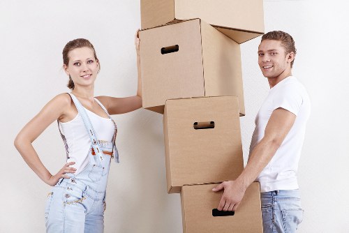 Packed office furniture and boxes ready for a business move in Maze Hill