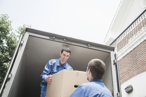Maze Hill removal team transporting boxes and household items