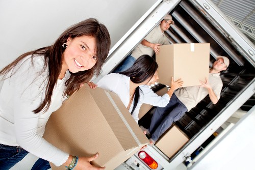Business relocation setup with labelled boxes and furniture in Maze Hill